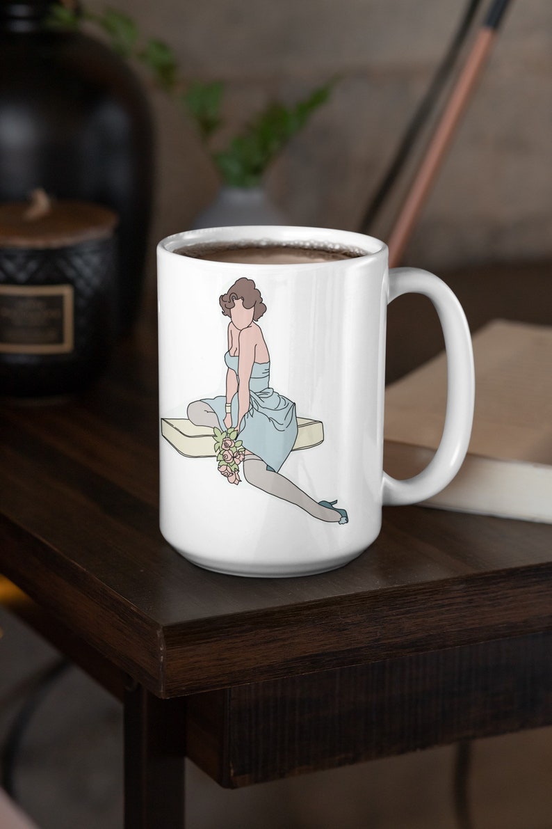 Brunette Pinup Artwork Coffee Mug featuring one of our original designs.